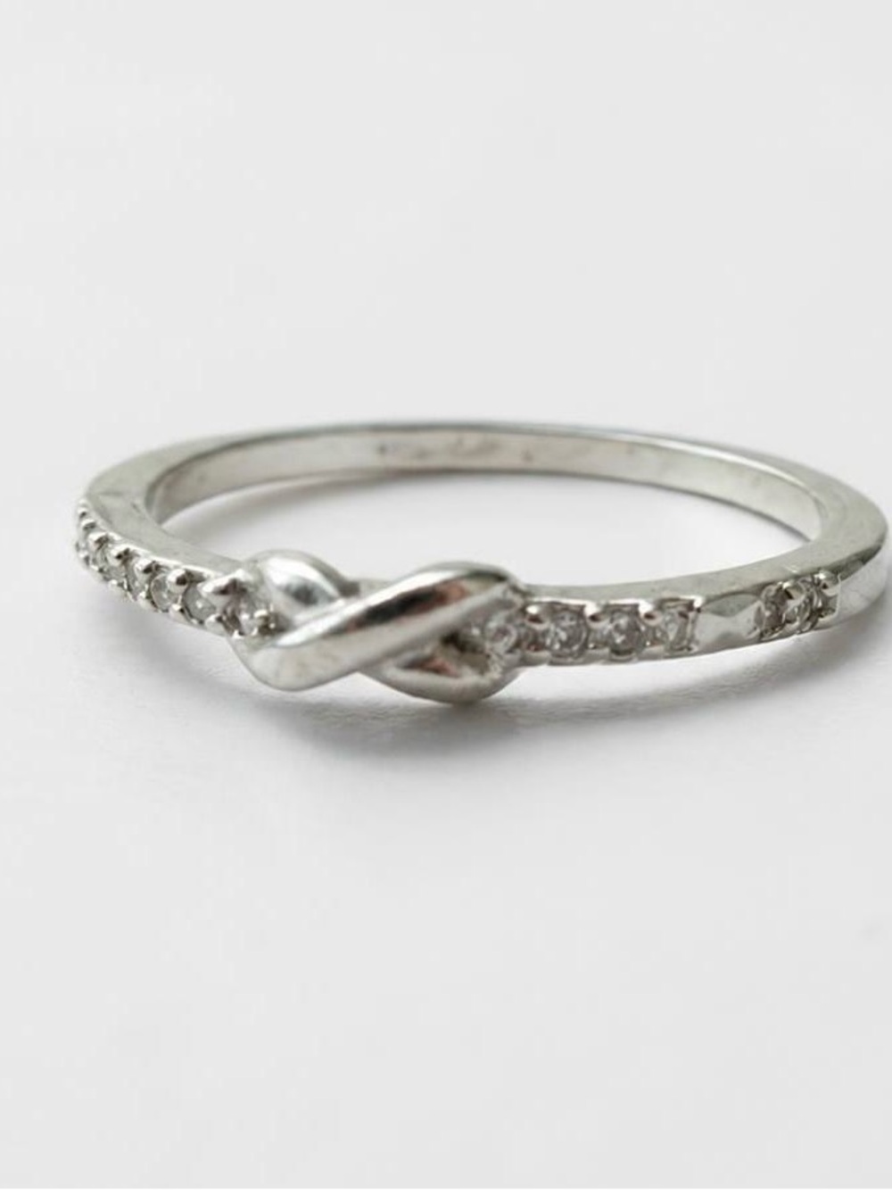 Delicate Silver Knot Ring with Pavé Accents - Women's Jewelry